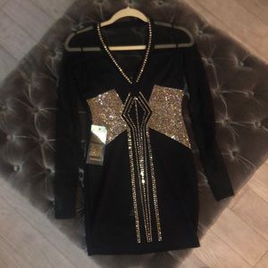 Stunning black embellished Bebe dress! NWT